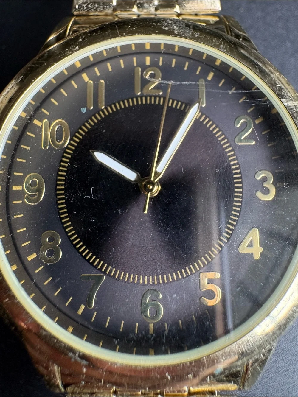 Gold Tone Watch with Black Dial